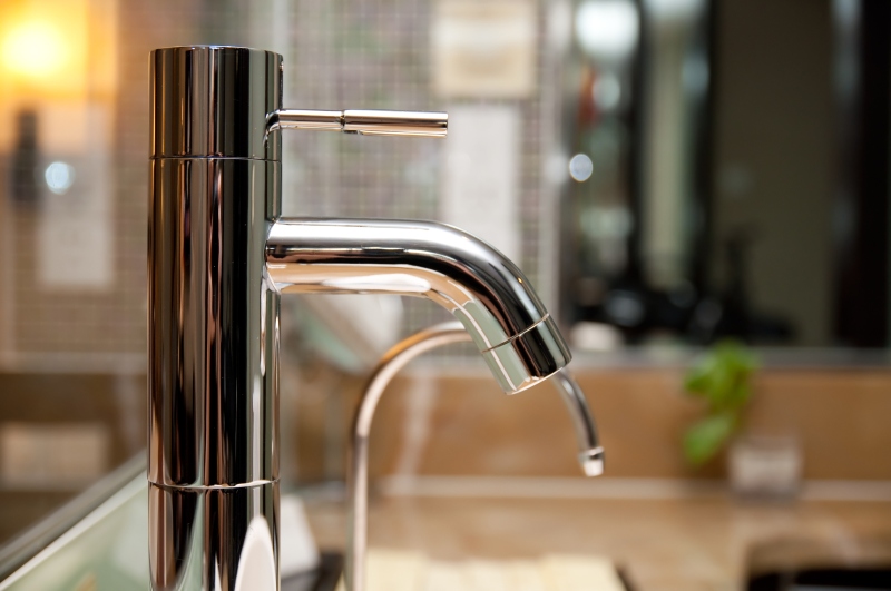 Leaking tap being repaired in Belgravia